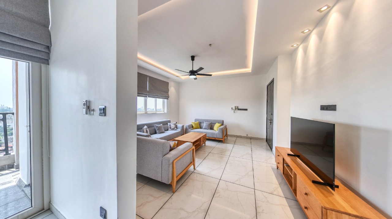 Finished living area with timber furniture in a Rush Lanka apartment